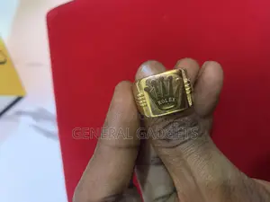 Gold Rolex Ring