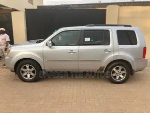 Honda Pilot Touring w/RES/Navi FWD (3.5L 6cyl 5A) 2010 Silver