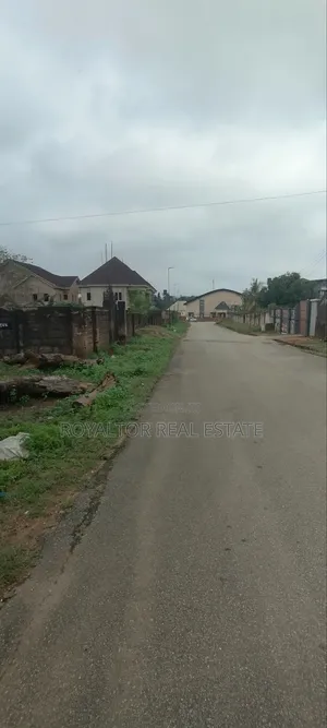 150ft by 150ft Fenced and Gated Along the Tarred Road