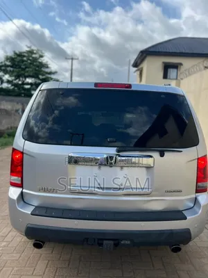 Honda Pilot Touring w/RES/Navi FWD (3.5L 6cyl 5A) 2010 Silver
