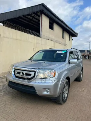 Honda Pilot Touring w/RES/Navi FWD (3.5L 6cyl 5A) 2010 Silver
