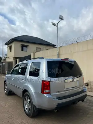 Honda Pilot Touring w/RES/Navi FWD (3.5L 6cyl 5A) 2010 Silver