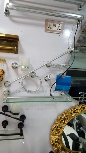 Title:
Silver Stainless Steel Bathroom Accessory Set With Glass Shelf