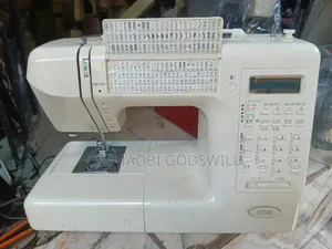 Original Monogram Electric Designer Machine and Button Holes Machine