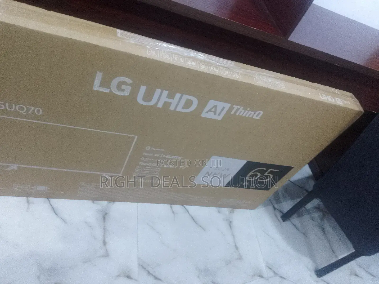 Lg 65" Smart Tv: Easy Voice Command Control