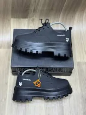 Black Naked Wolfe Platform Lace-Up Shoes.
