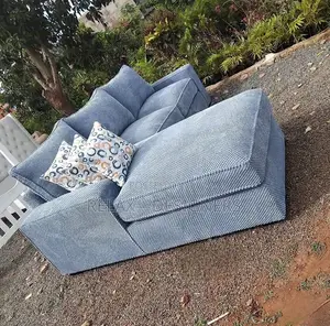 L Shaped Sofa With Throw Pillows