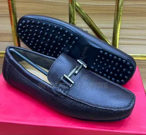 Tod's Black Leather Loafers