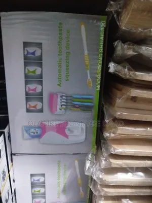 Tooth Brush and Toothpaste Dispenser