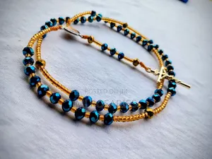 Iridescent Blue and Golden Crystal Beads - With Gold Toned Crucifix.