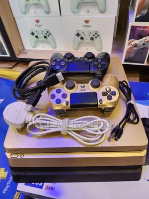 Uk Ps4 Slim + Fc25/26 Installed – 2 Pads Included