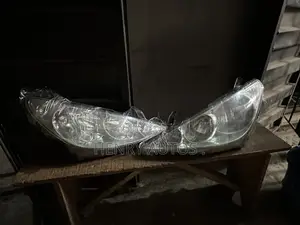 Set Headlamp Previa 2005