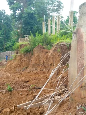 A Plot And Half With Uncompleted Building