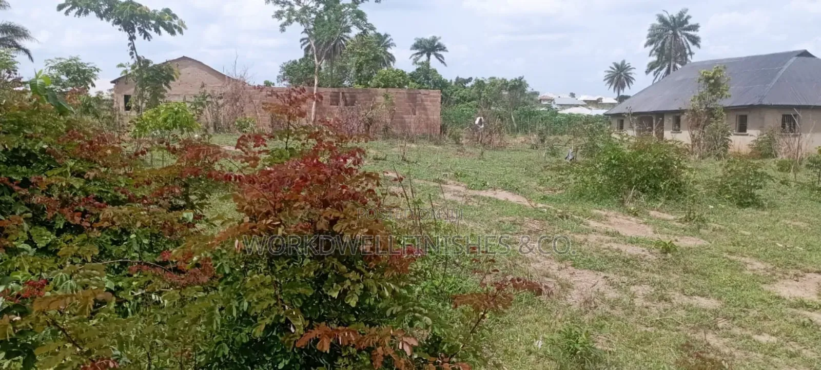 A Plot And Half With Uncompleted Building