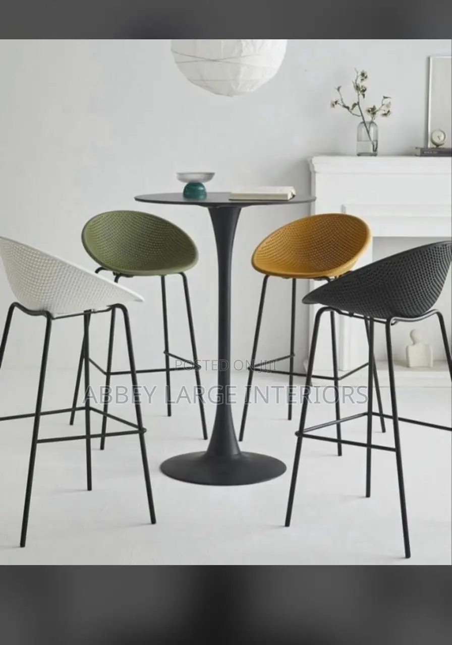 Four Bar Stools With One Table