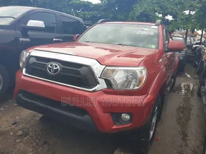 Toyota Tacoma 4dr Access Cab 4WD 6.1 ft. SB (2.7L 4cyl 4A) 2014 Red