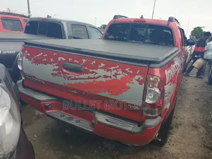 Toyota Tacoma 4dr Access Cab 4WD 6.1 ft. SB (2.7L 4cyl 4A) 2014 Red