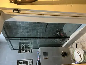 Plane Sliding Shower Cubicle With Black Accessories