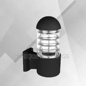 Outdoor Wall Light. Made of Pure Cast and Glass
