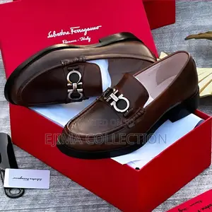 Luxury Salvatore Ferragamo Gancini Buckle Leather Loafers.
