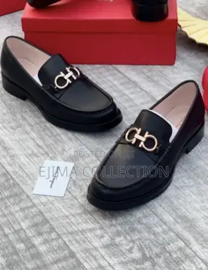 Luxury Salvatore Ferragamo Gancini Buckle Leather Loafers.