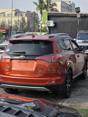 Toyota RAV4 SE AWD (2.5L 4cyl 6A) 2016 Orange