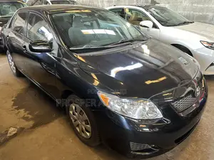 Toyota Corolla Base 4dr Sedan (1.8L 4cyl 5M) 2010 Black