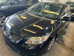 Toyota Corolla Base 4dr Sedan (1.8L 4cyl 5M) 2010 Black