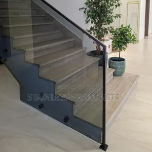 Sleek Sophisticated: Dark Grey Glass Railings