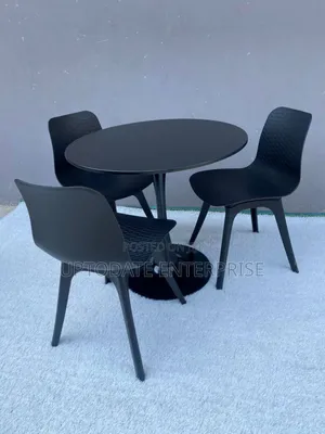 Restaurant Table by Three Chairs