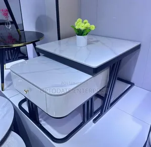 Restaurant Table by Three Chairs