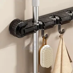 Wall-Mounted Mop Broom Organizer With Suction Cup