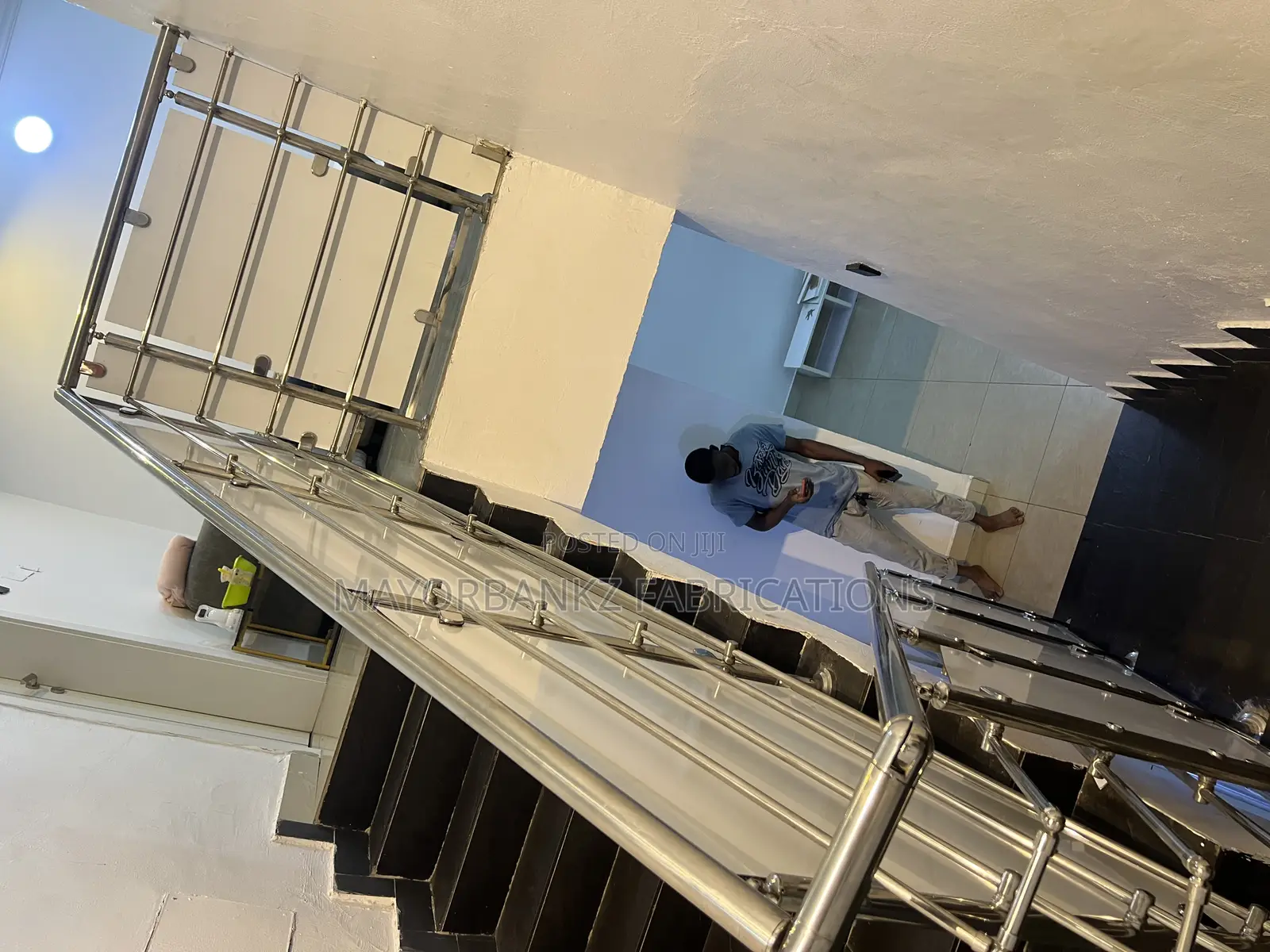 Stainless Handrail Protected With Boards