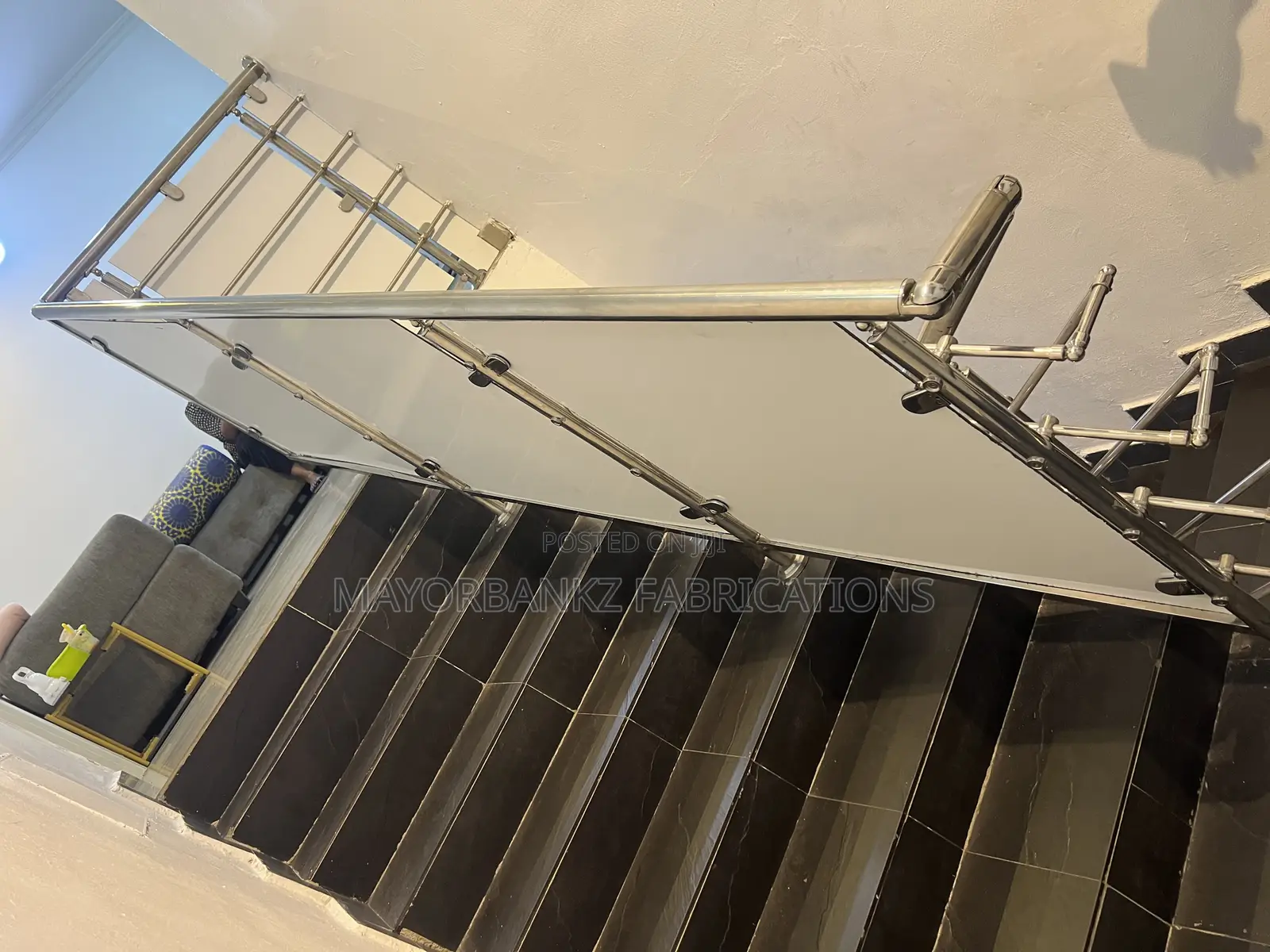 Stainless Handrail Protected With Boards