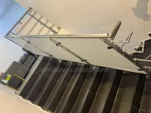 Stainless Handrail Protected With Boards