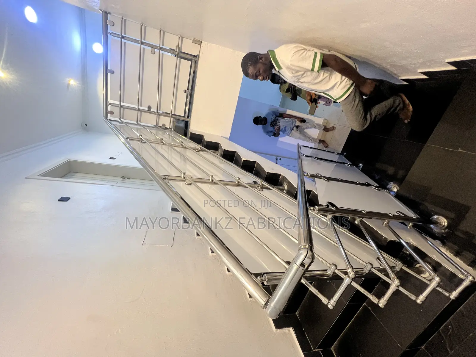 Stainless Handrail Protected With Boards