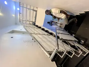 Stainless Handrail Protected With Boards