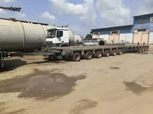 Long Range Low Bed for Heavy Machineries Available for Hire