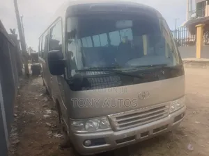 Toyota Coaster 2010 Gold