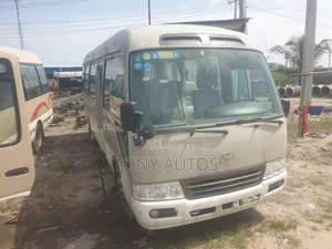 Toyota Coaster 2012 Gold