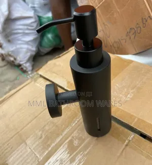 Wall Mounted Black Soap Dispenser.