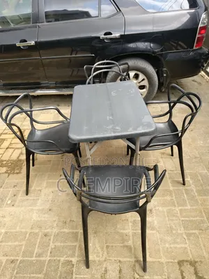 Plastic Chairs and a Table