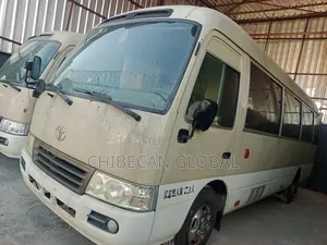 Toyota Coaster 2014 Gold