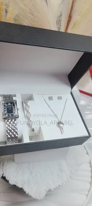 Cartier Female Wrist Watch and Necklace Combo.