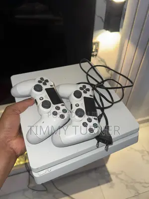 Uk Used Ps4 Slim With Two Pads and Games Installed