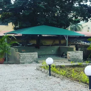 Galvanized Pipe Carport With Green Covering - Eco-Friendly Solution