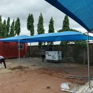 Galvanized Pipe Carport With Blue Covering - Skyward Look