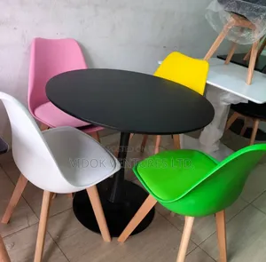 Dining Table With 4 Chairs With Wooden Legs.