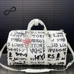 Pre-loved Stephen Sprouse X Louis Vuitton Monogram Duffle Bag