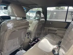 Honda Pilot EX-L 4dr SUV 4WD w/Rear Entertainment (3.5L 6cyl 5A) 2014
